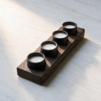 Stoere kaarsenhouder met 4 kaarsen en massief hout
